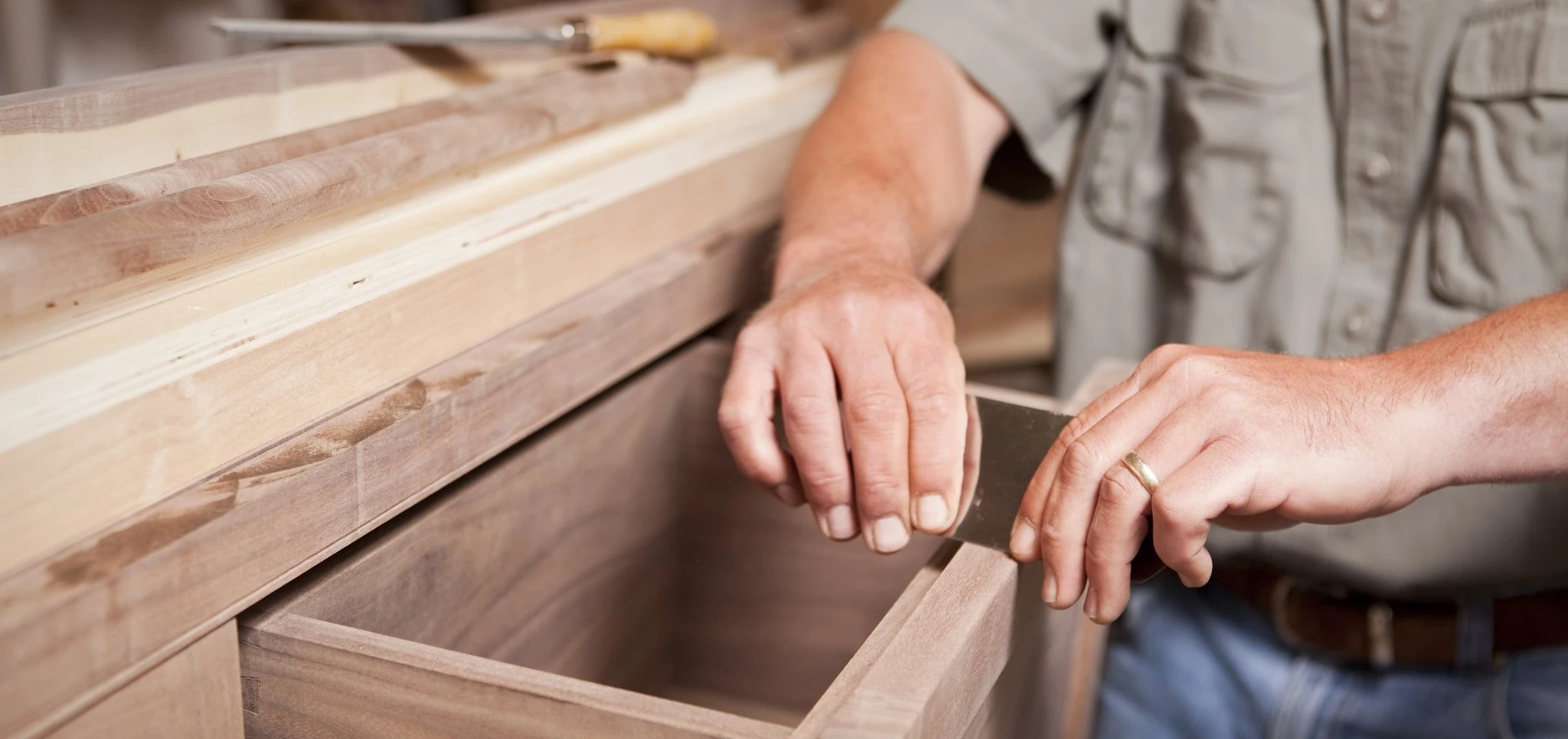 an image of a man doing woodwork